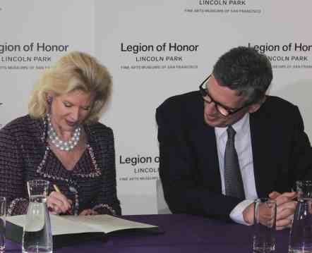 Henri Loyrette, director of the Musée du Louvre, looks on as Diane B. Wilsey, president of the Board of Trustees of FAMSF, signs an accord on November 15, 2012, which paves the way for more collaboration between the two museums and a series of exhibitions bringing artworks from Louvre to San Francisco and works from FAMSF to Paris for exhibition.  Photo: Geneva Anderson