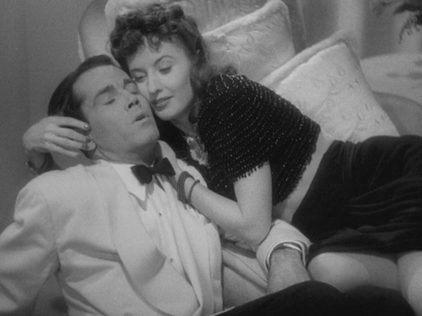 Henry Fonda and Barbara Stanwyck in Preston Sturges' “The Lady Eve” (1941).   Card shark Stanwyck is out to fleece Fonda, the naïve heir to a brewery fortune who is also a snake enthusiast coming home from an Amazon expedition.  Her scheme is quickly abandoned when she falls in love with her prey but is exposed anyway and shunned by Fonda.  Her plan to re-conquer his heart involves assuming a false identity and unabashed flirtation.  No one more convincingly desired a man.  In the famous scene where Fonda adjusts Stanwyck’s shirt downward to expose less skin, Thomson, in his book “Moments that Made the Movies,” linked this act of restraint with the inelastic film censors of the times, observing that Sturges was a brilliant master of the double entendre.   Photo: courtesy the San Francisco Film Society